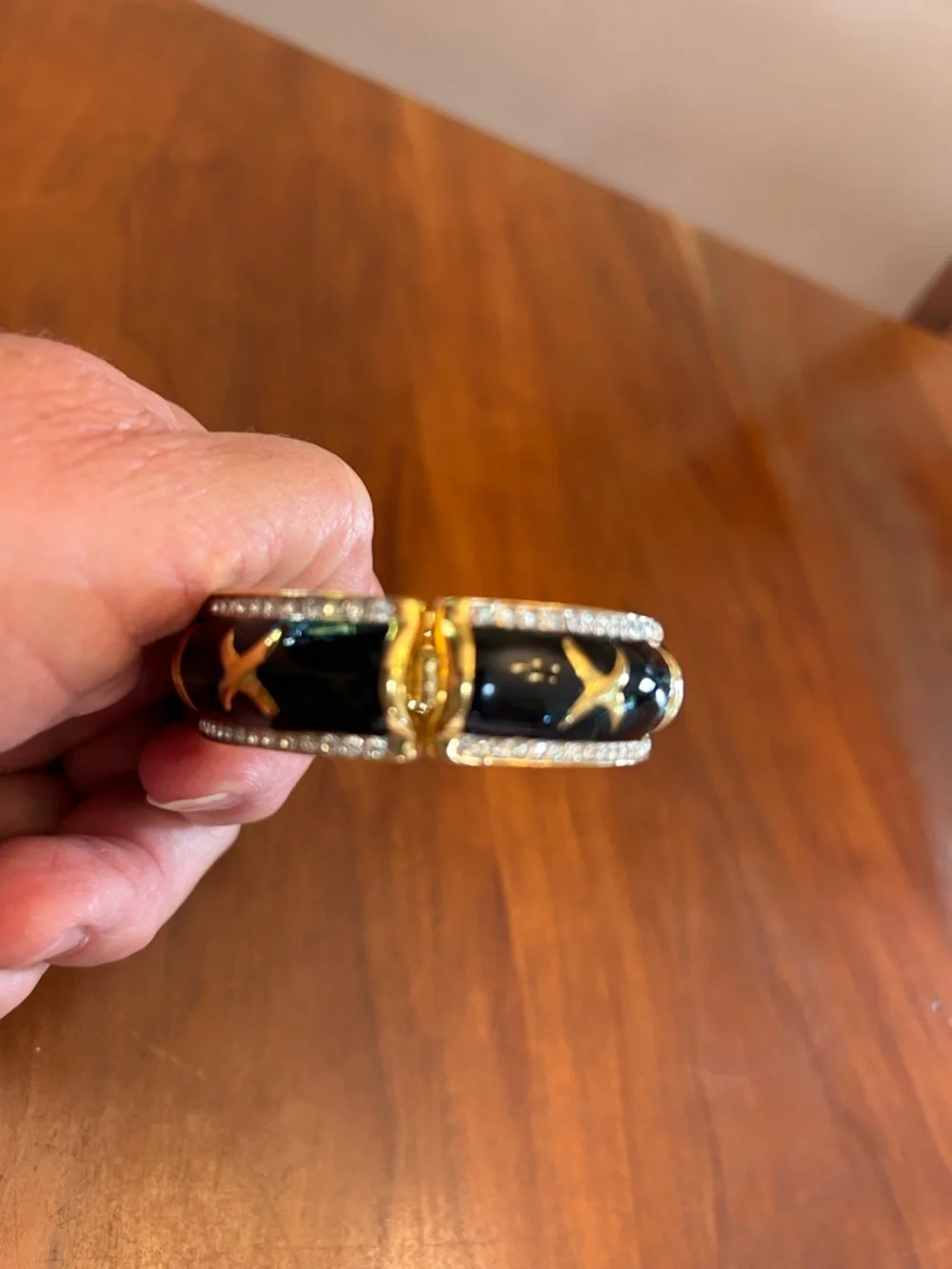Gold-Tone Black Enamel X Accent Bangle Bracelet